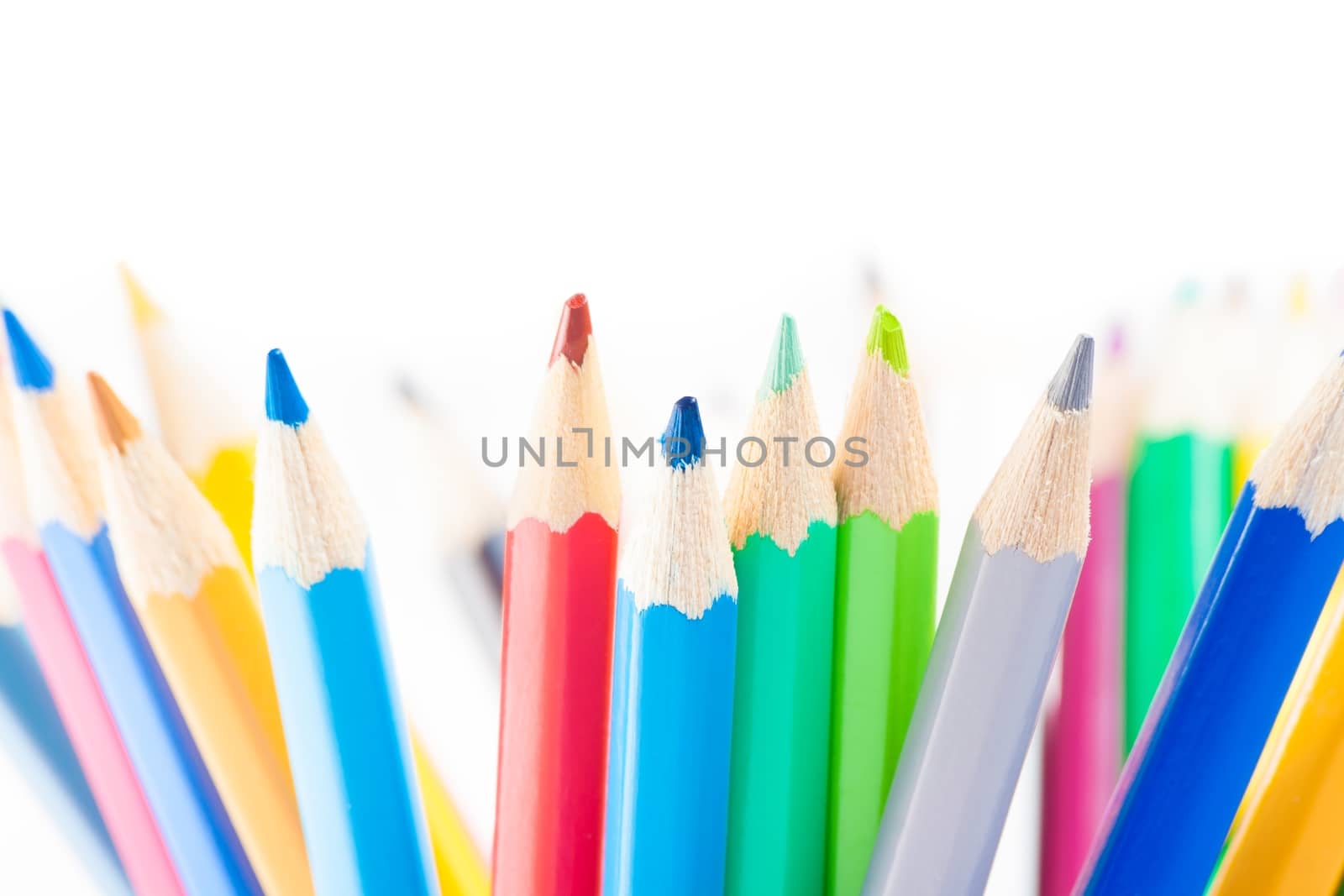 colorful pencils isolated with space for text, time to school by donfiore