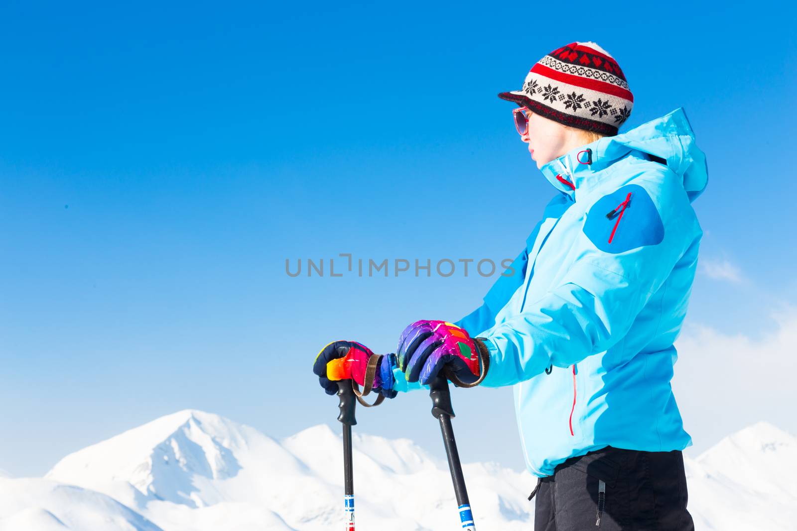 Woman skier in the Alps Mountains, Triglav natural park, Vogel, Slovenia.