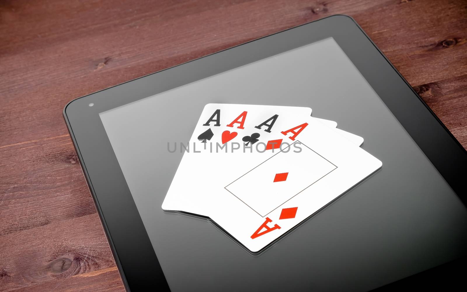 poker cards on digital tablet pc, concept of texas poker online by donfiore