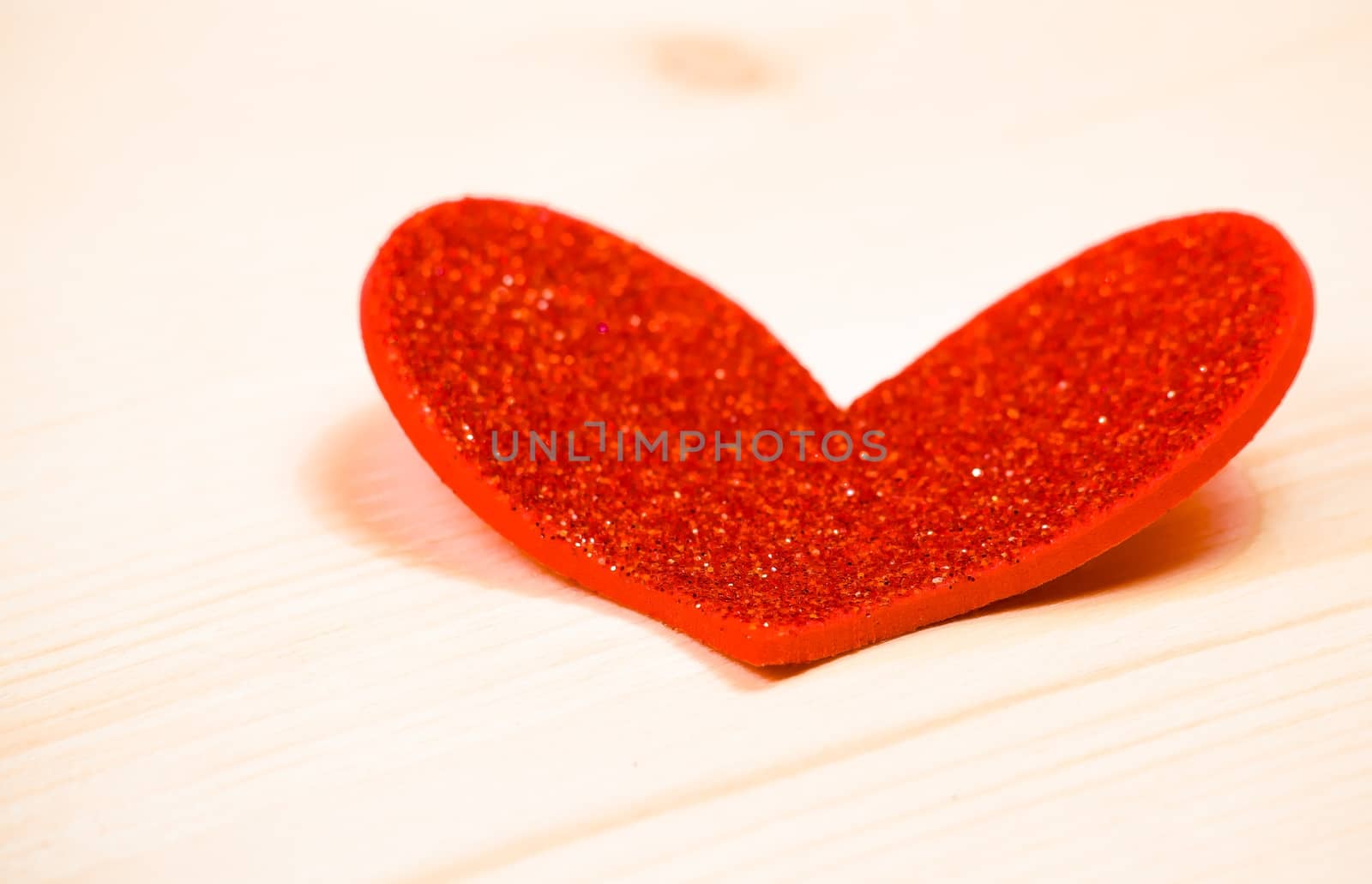 valentine day series, one decorative red heart on wood background with space for text, concept of valentine day