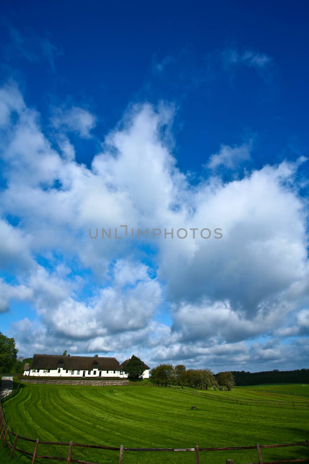 Landscape with old farm in spring in Denmark