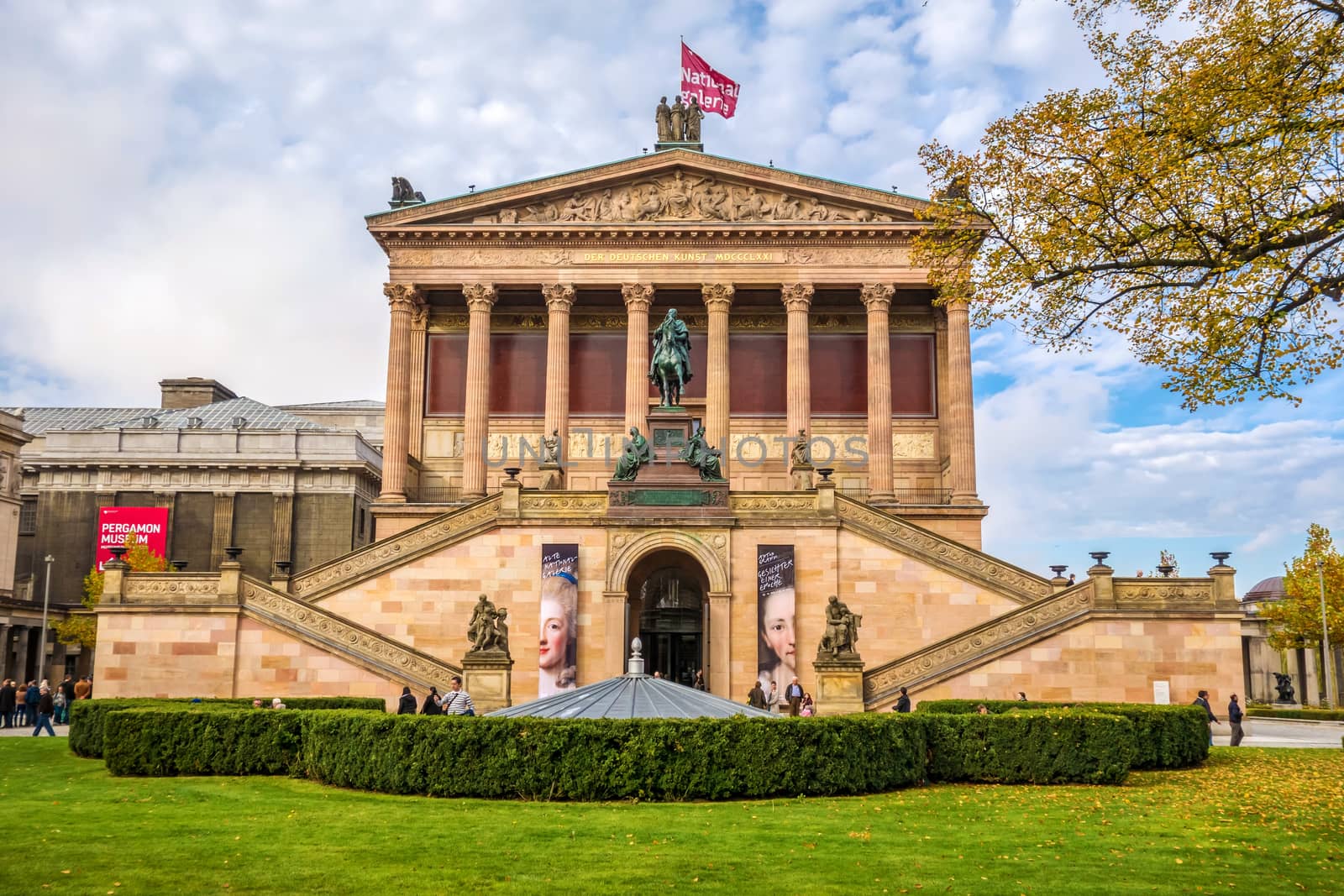 Berlin, Germany - October 26, 2013: Exterior view of Alte Nationalgalerie (Old National Gallery) on the Museumsinsel in Berlin-Mitte. The Pergamon museum on the left in the background.