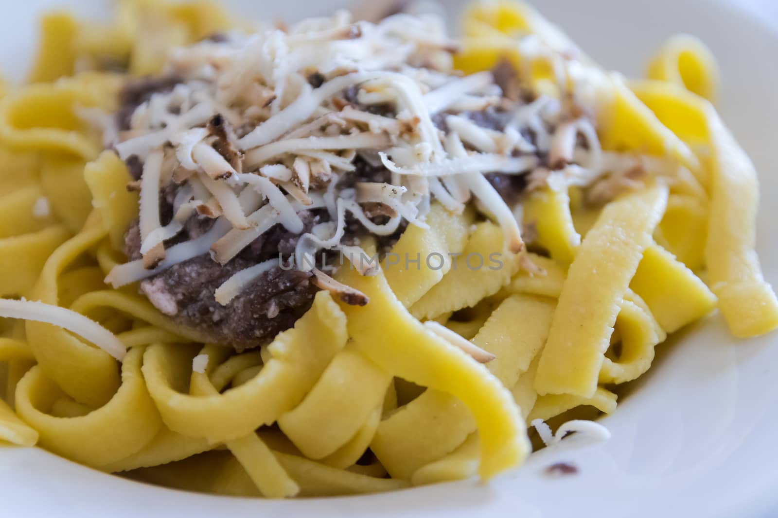 handmade tagliatelle with radicchio, mushrooms and smoked ricotta