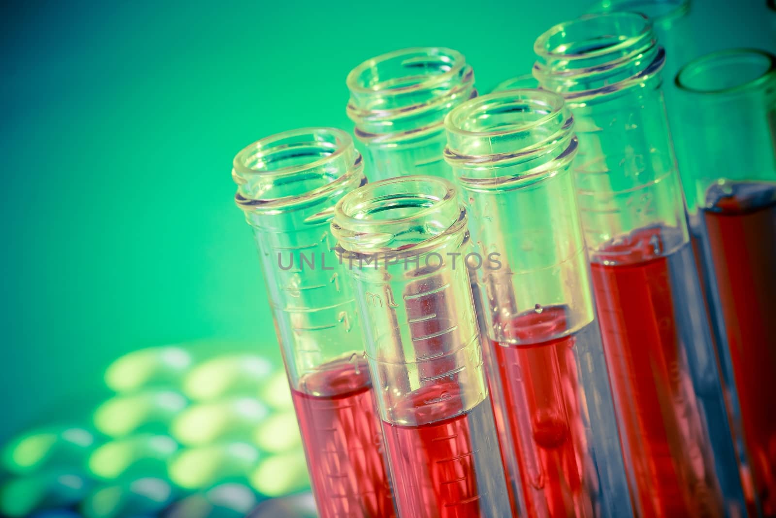 test tubes with red liquid in laboratory  by donfiore