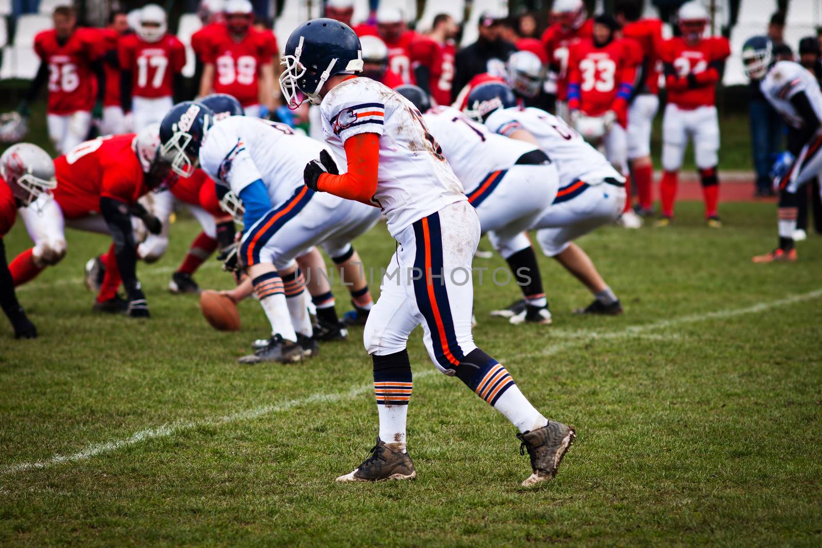 american football on stadium by melis