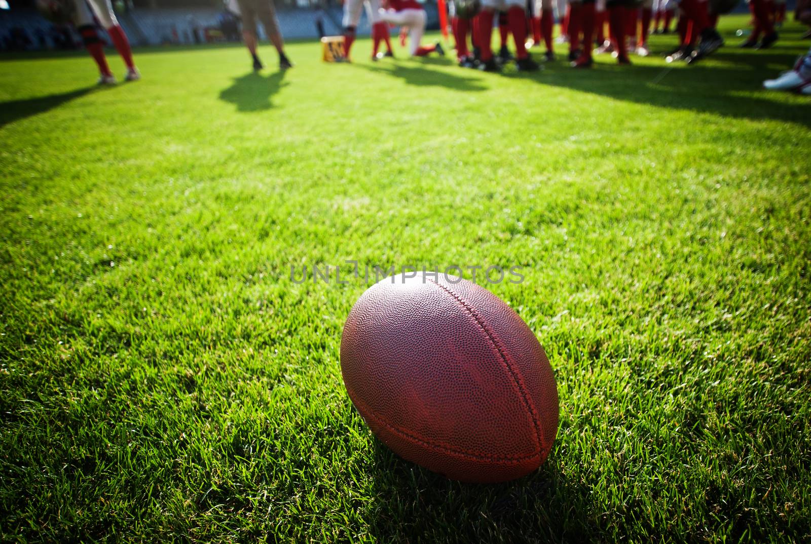 american football on stadium by melis