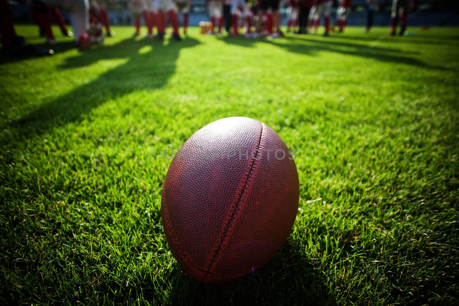 american football on stadium by melis