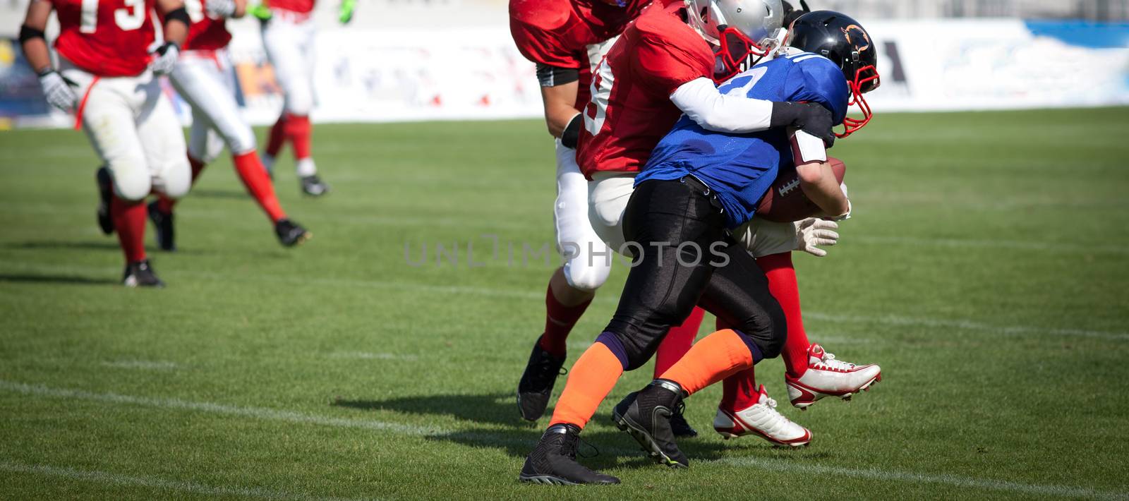 american football on stadium by melis