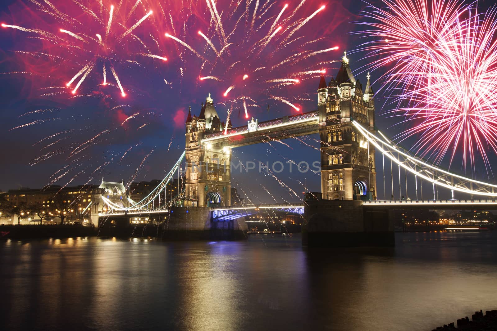 Tower bridge with firework, celebration of the New Year in London, UK