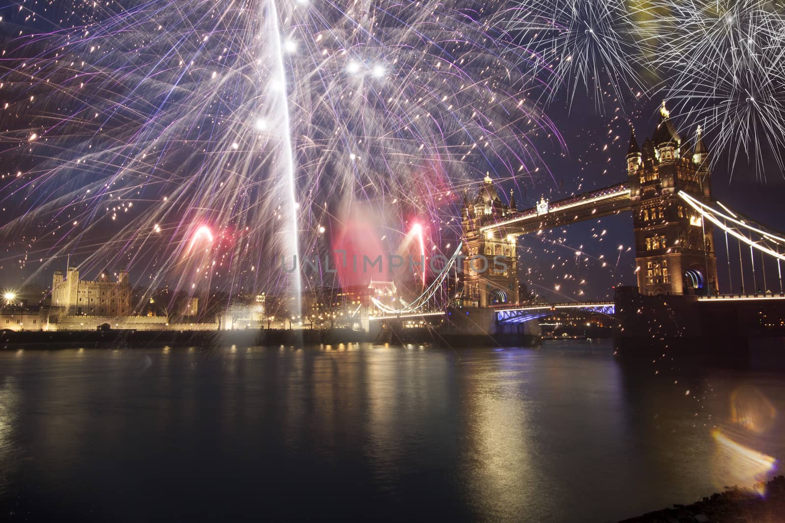 Tower bridge with firework, celebration of the New Year in London, UK