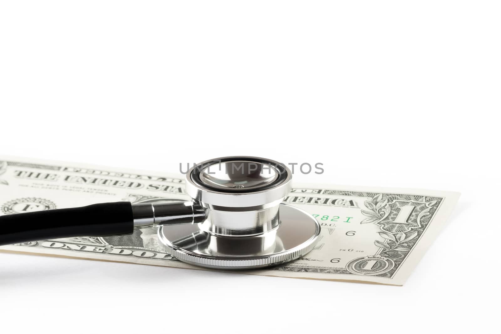 stethoscope on one dollar, cost of medical health care by donfiore