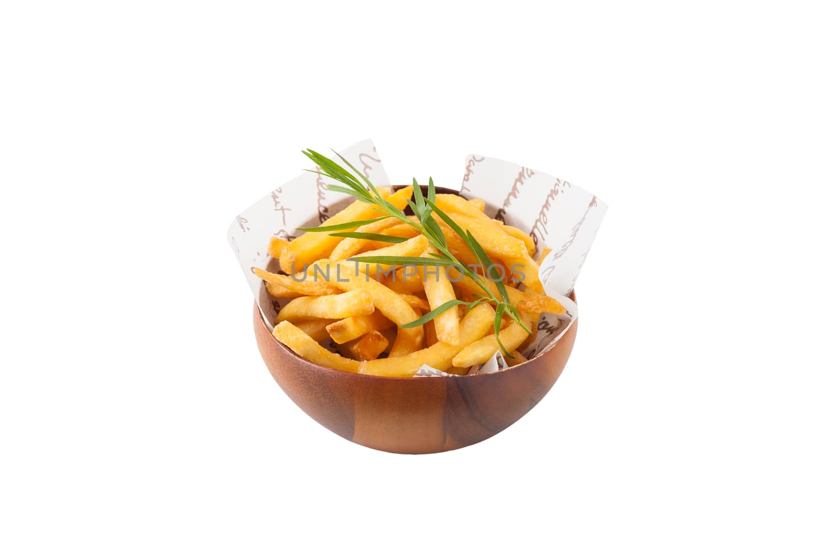 French fries in wood bowl garnished with Japanese bamboo leaves isolated on white background