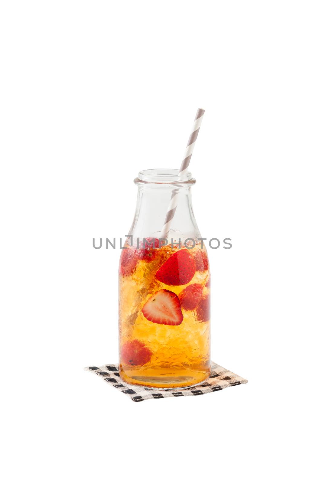 Iced strawberry tea in glass bottle with striped straw isolated on white background with clipping path