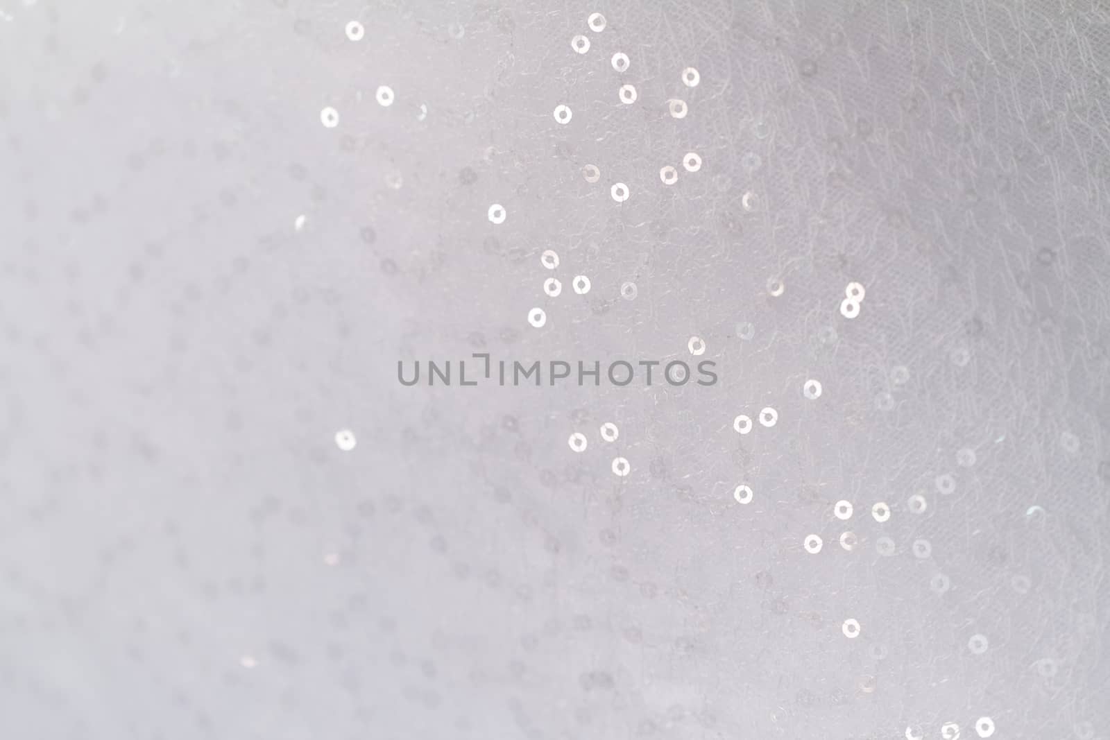 Close up photo of a sequined wedding dress
