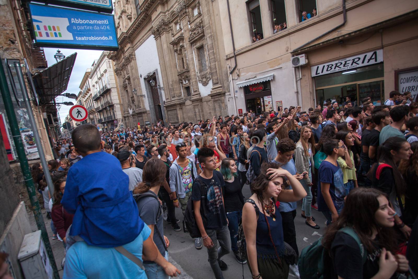 ITALY, Palermo: Thousands of students marched and held banners against Renzi's school reform in Palermo, Italy on October 9, 2015.A theme of the protests is the revisions to the calculation of family income, which some say will reduce scholarships and housing for students. Students throughout the country protested what's know as La Buona Scuola.  A spokesman for the protesters said they were going to announce a week of mobilization lasting until October 17. They plan to launch an attack for free education and reversal of policies. 