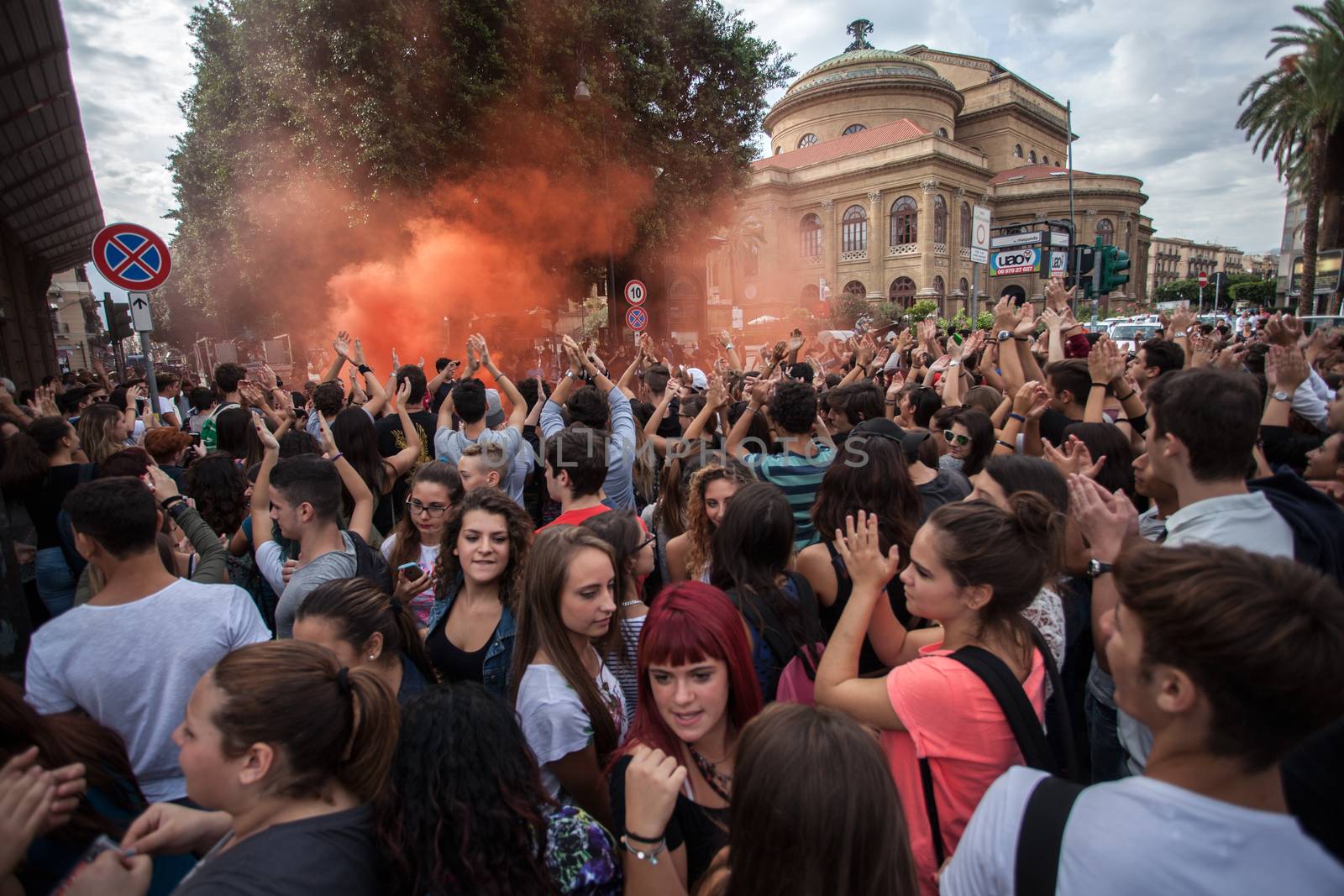 ITALY, Palermo: Thousands of students marched and held banners against Renzi's school reform in Palermo, Italy on October 9, 2015.A theme of the protests is the revisions to the calculation of family income, which some say will reduce scholarships and housing for students. Students throughout the country protested what's know as La Buona Scuola.  A spokesman for the protesters said they were going to announce a week of mobilization lasting until October 17. They plan to launch an attack for free education and reversal of policies. 