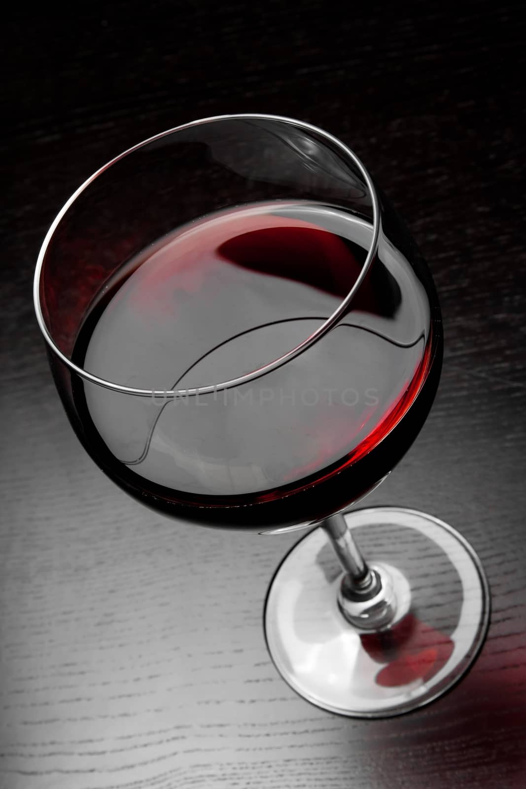 top of view of red wine glass by donfiore