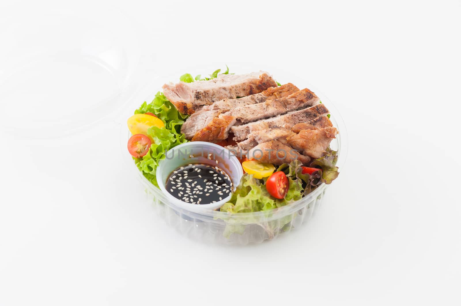 Grilled pork and teriyaki sauce (Japanese sweet sauce) cooked by clean food concept with salad in lunch box