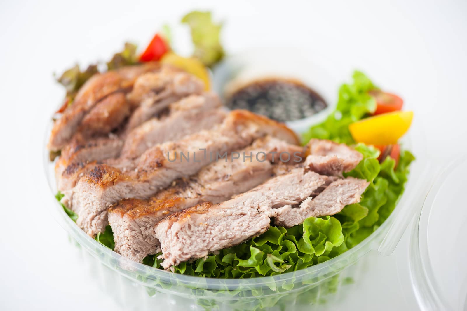 Grilled pork and teriyaki sauce (Japanese sweet sauce) cooked by clean food concept with salad in lunch box