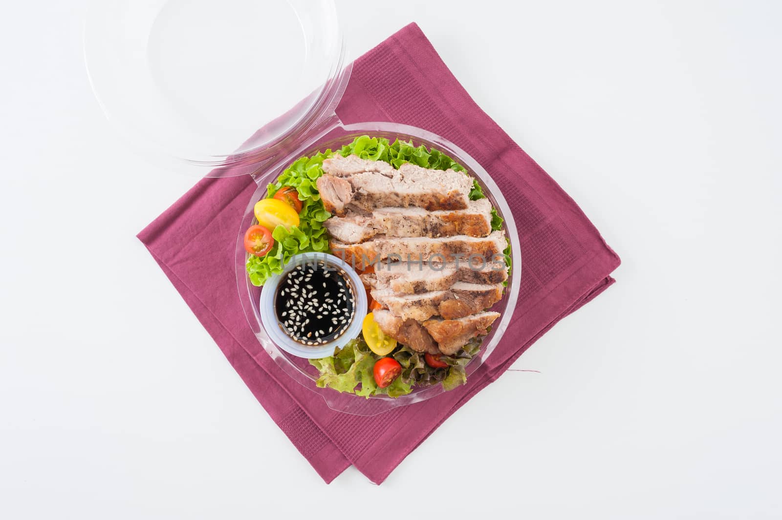 Grilled pork and teriyaki sauce (Japanese sweet sauce) cooked by clean food concept with salad in lunch box