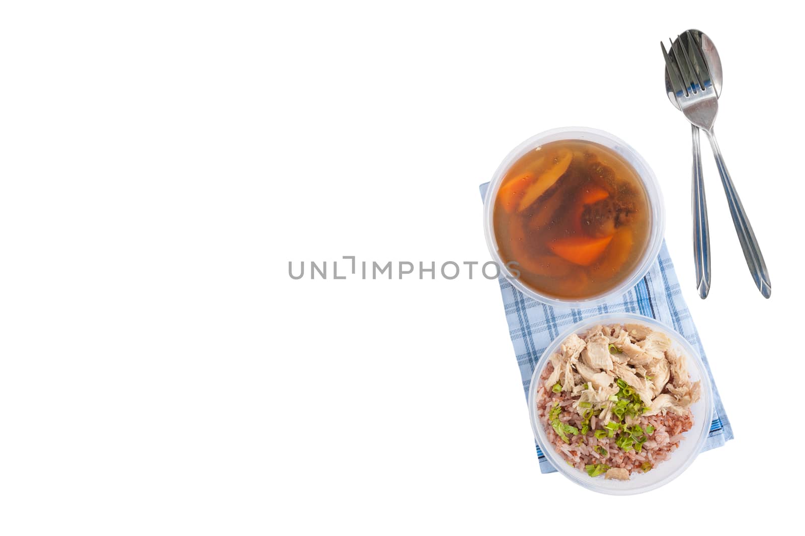 Brown rice gruel with chicken breast with vegetables soup cooked by clean food concept in separate lunch box isolated on white background