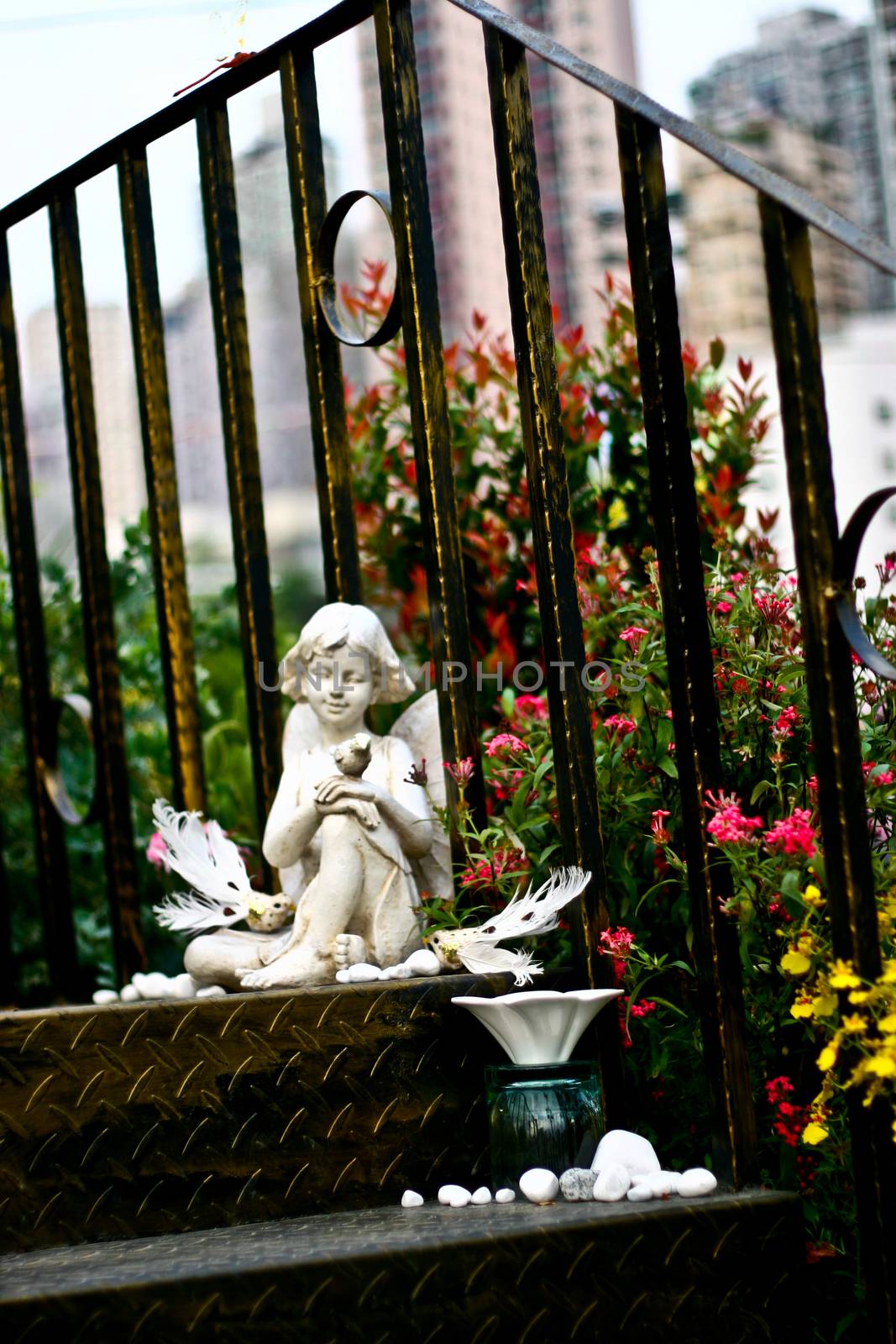 Angel with flowers and plants