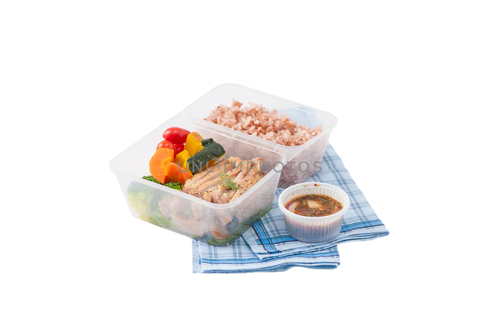 Roasted pork tenderloin with vegetables cooked by clean food concept with brown rice and Northern Thai local sauce isolated on white background with clipping path