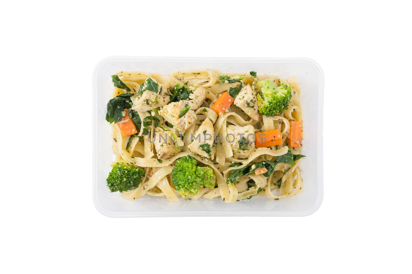 Fettuccine pesto sauce with spinach, grilled fish and vegetables cooked by clean food concept in lunch box isolated on white background with clipping path