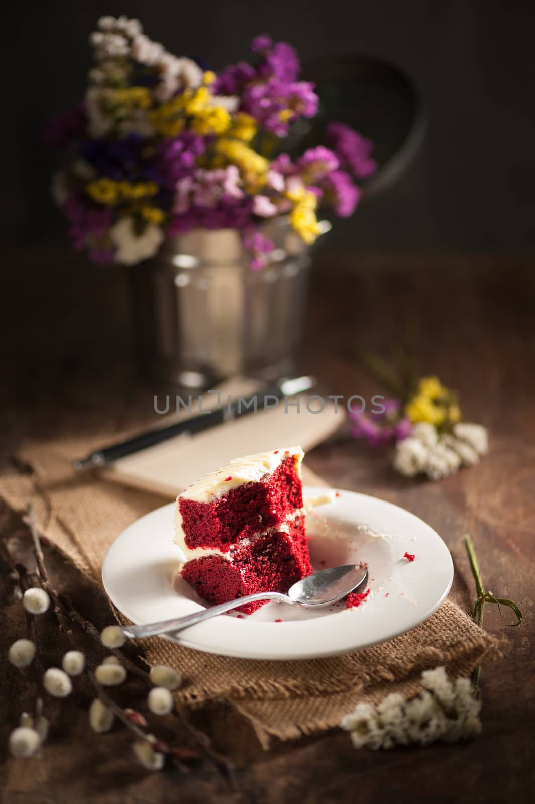 Bits of Red velvet cake in cafe with low key scene