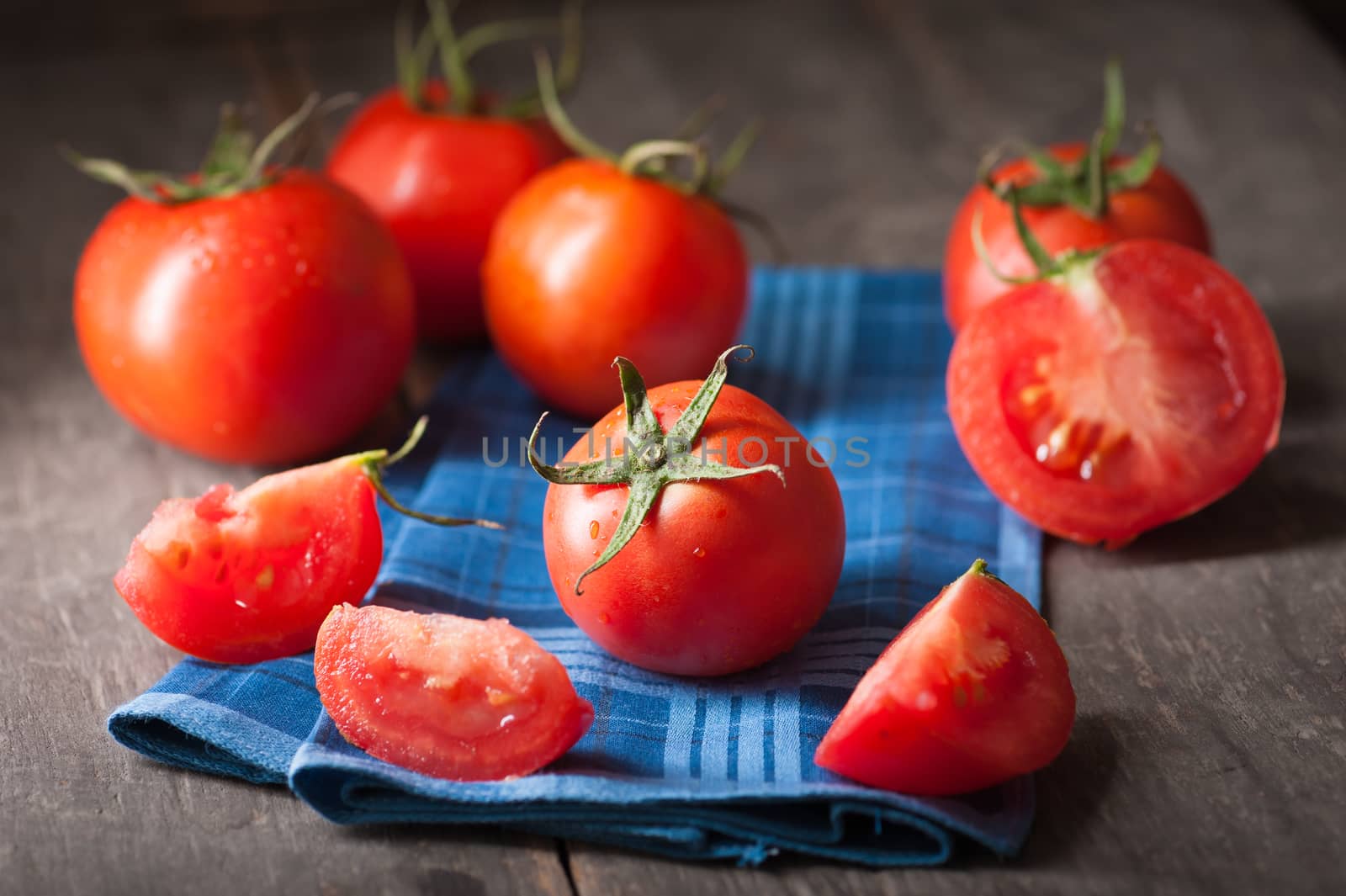 Vegetables on wood table with low key scene