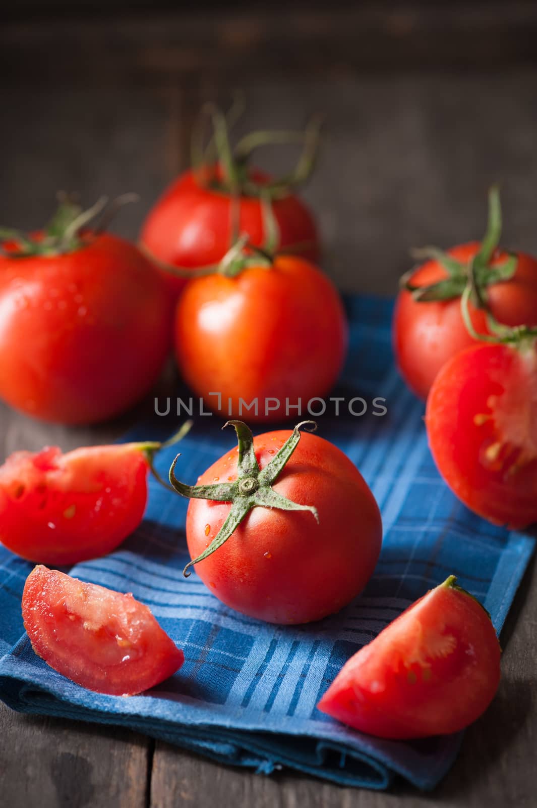 Vegetables on wood table with low key scene