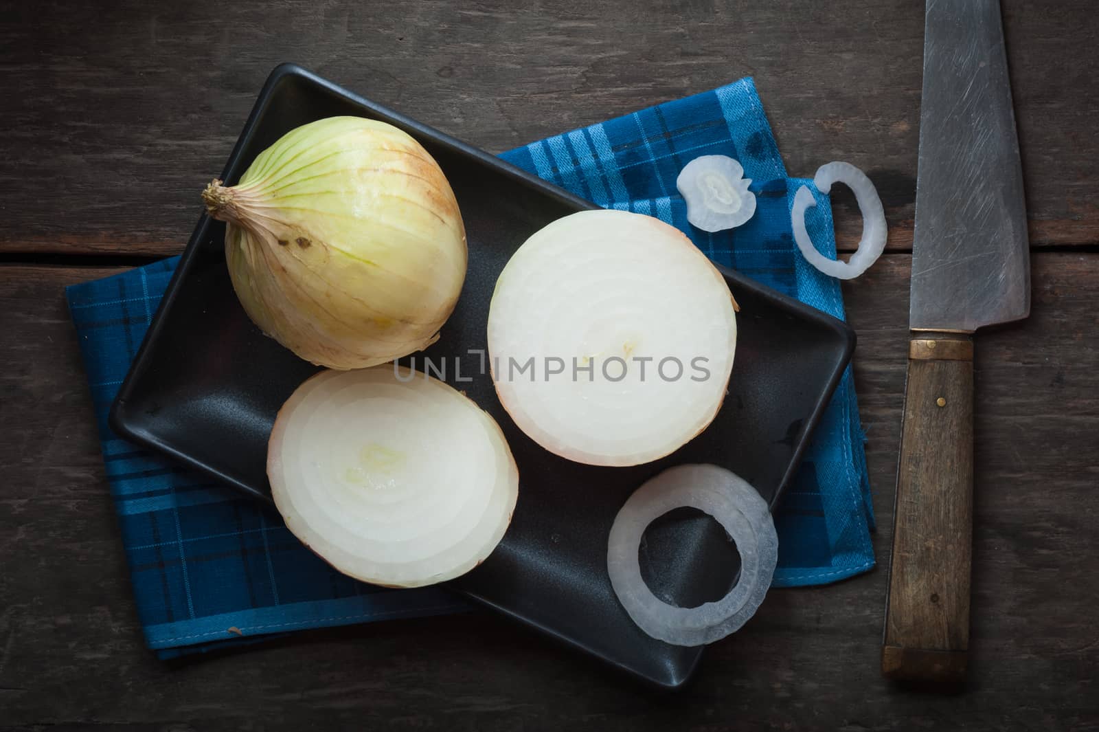 Vegetables on wood table with low key scene