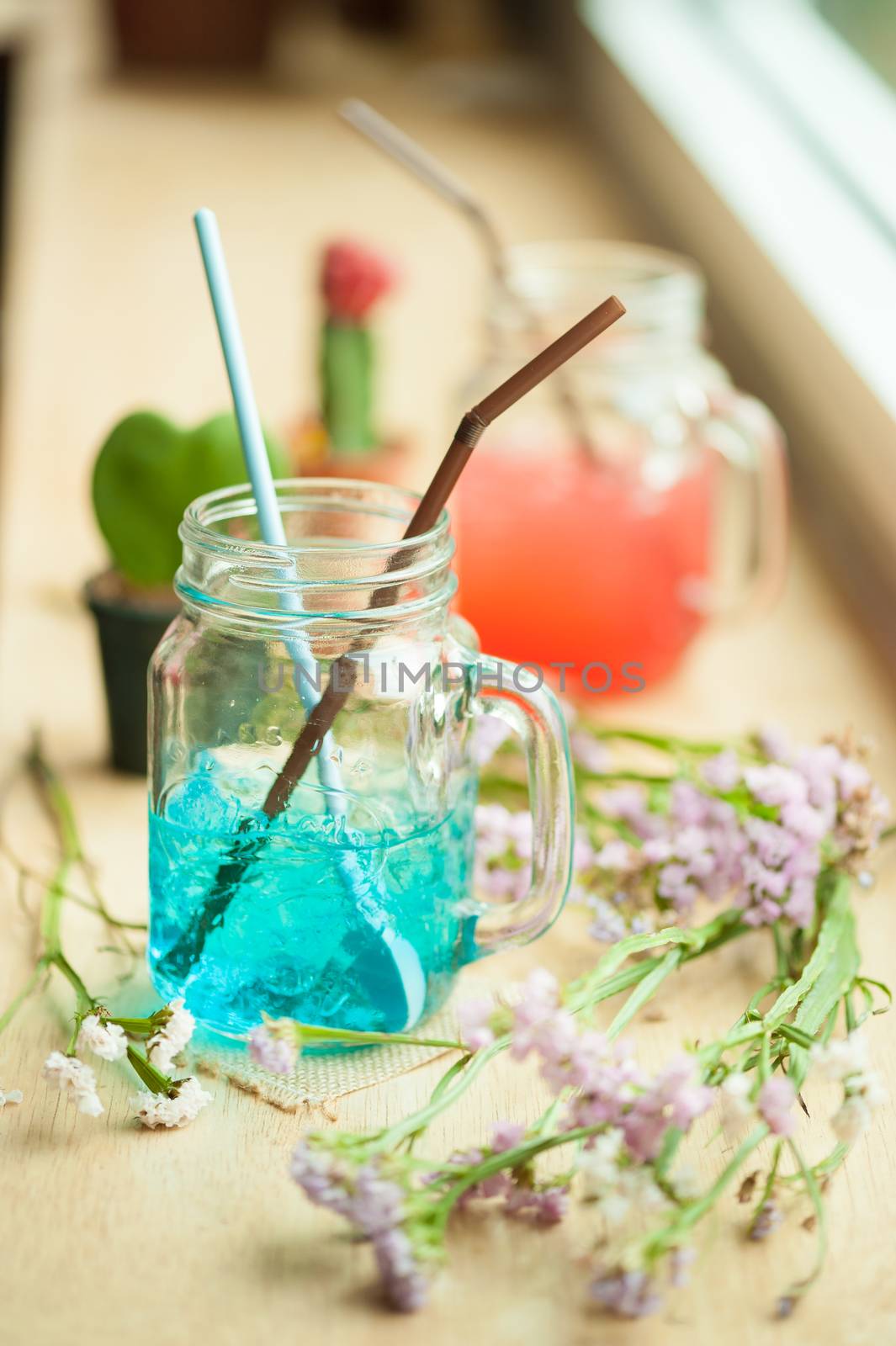 Italian soda on wood bar in cafe