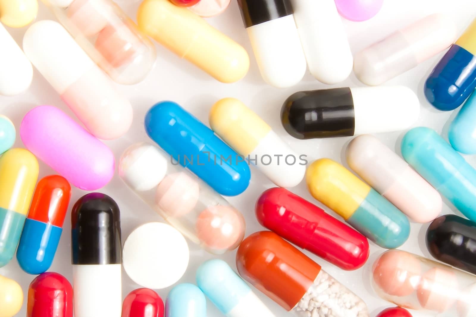 top of view of medical pills on white table