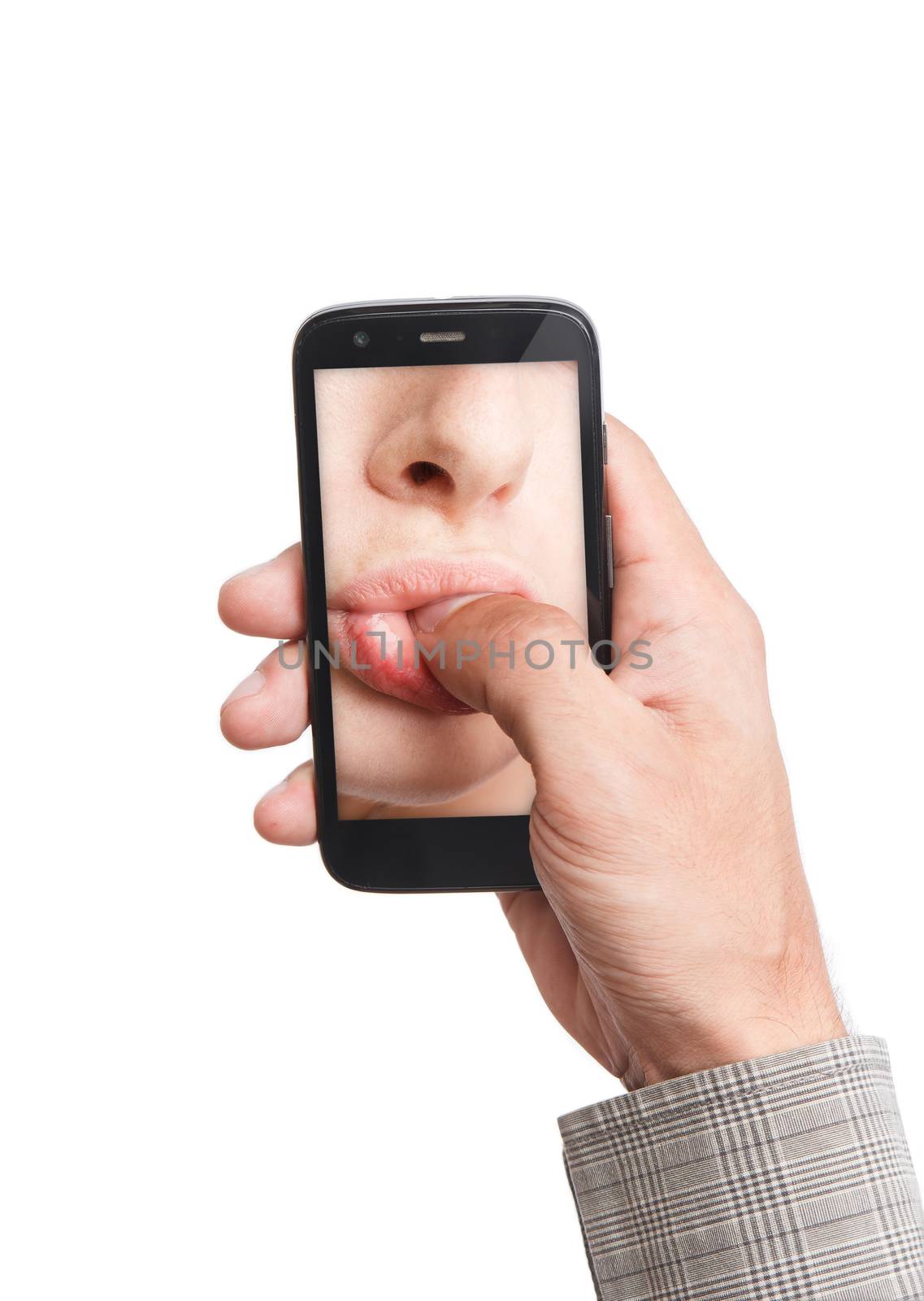 Conceptual, social networking, technology: hand holding mobile phone with lips sucking thumb, bringing people together