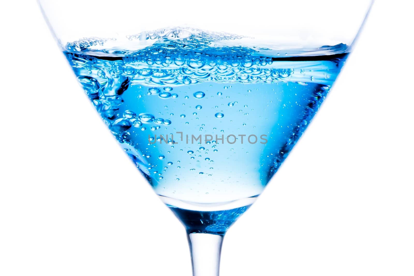 detail of blue cocktail with bubbles by donfiore