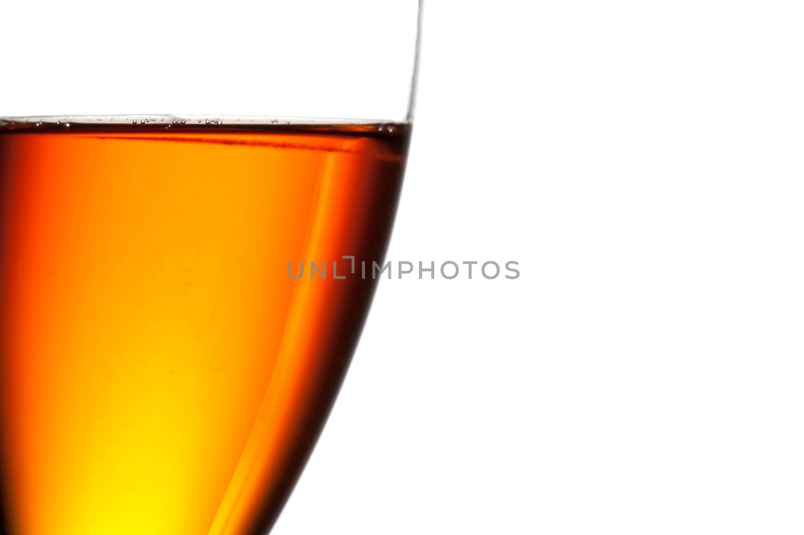 half glass with red cocktail with space for text on white background