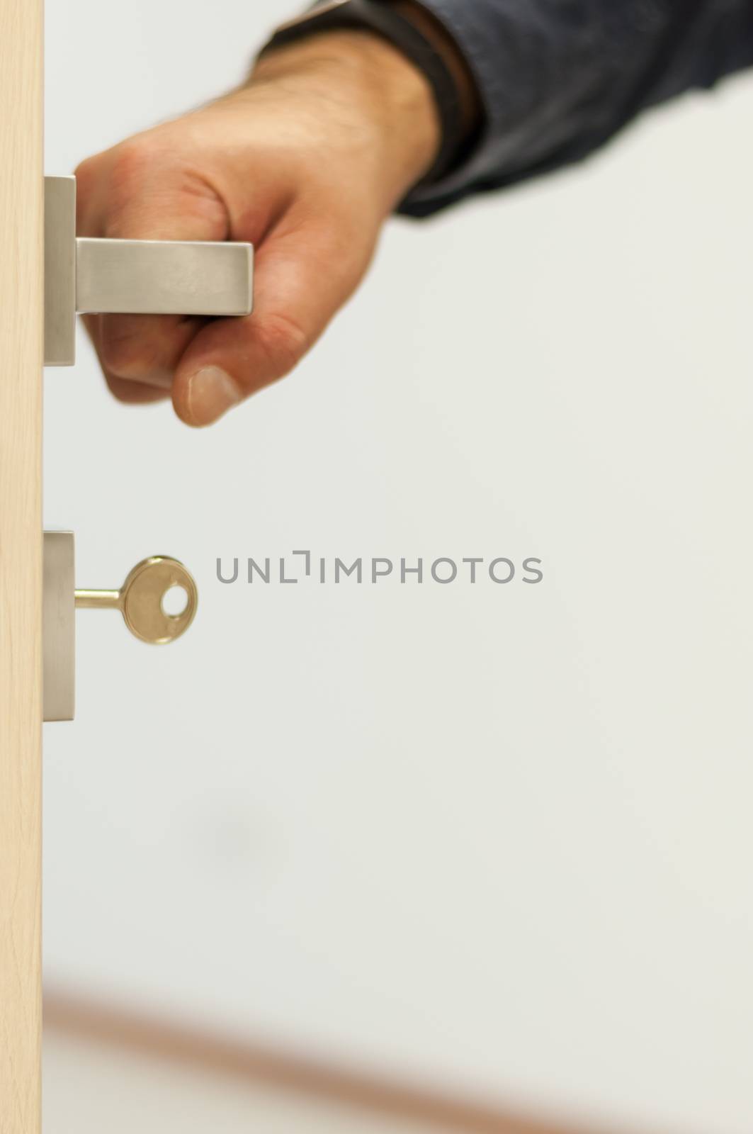 Door with an hand on the handle