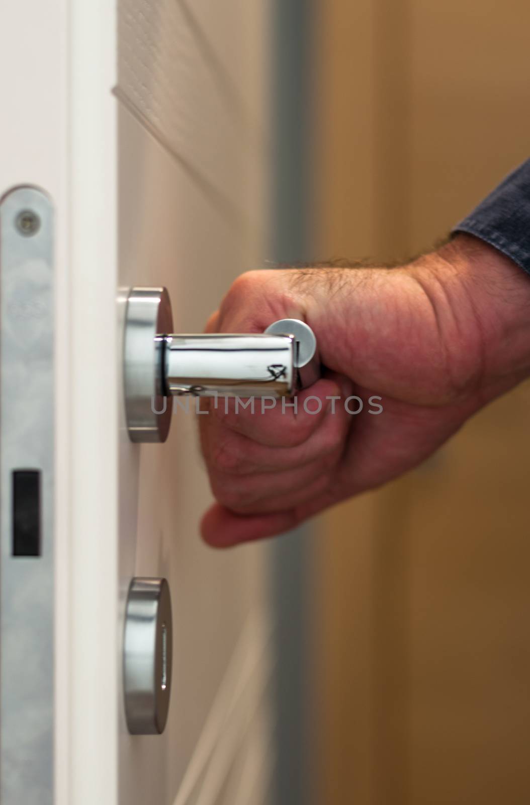 Door with an hand on the handle