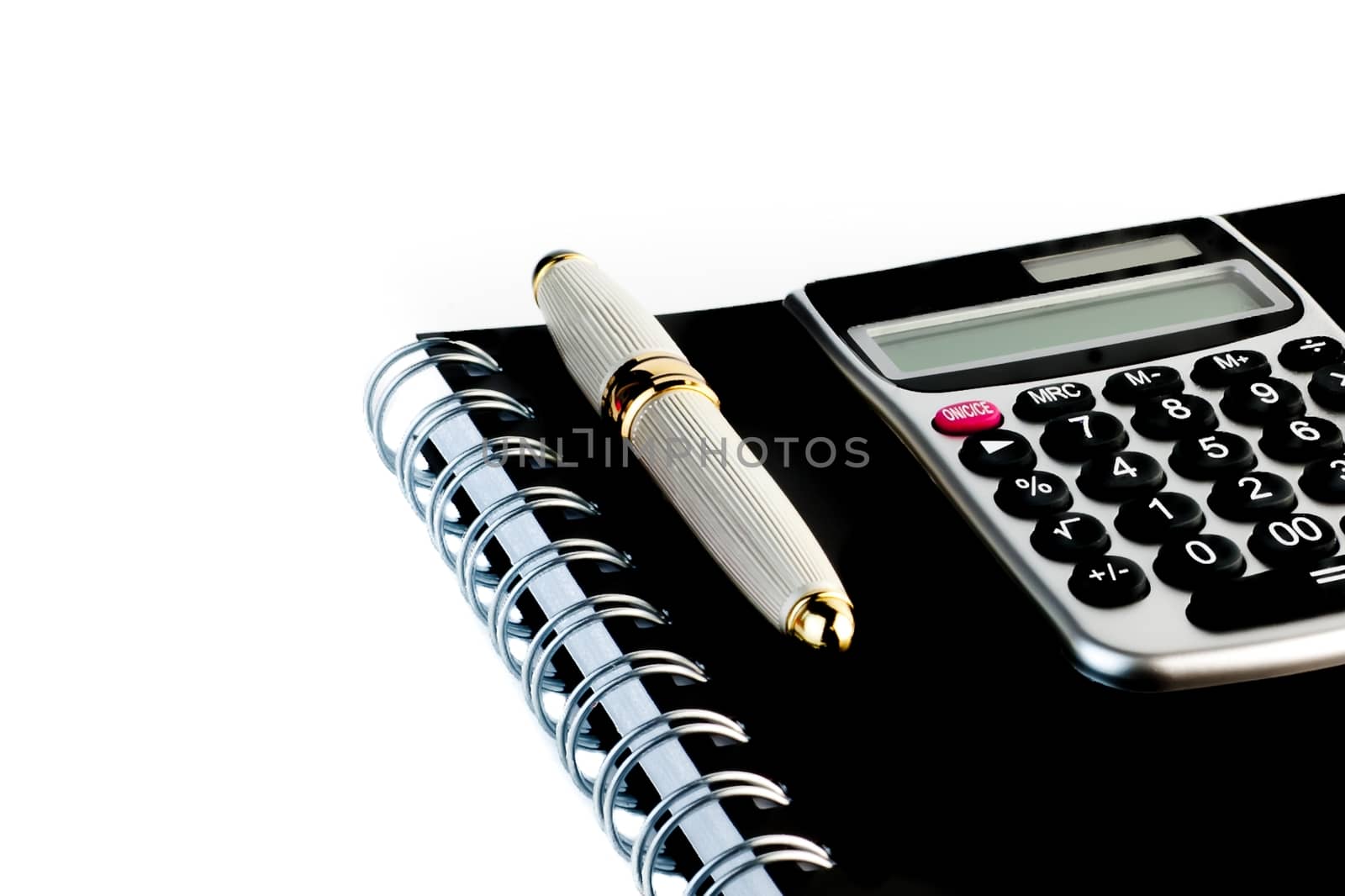 business pen on notepad  by donfiore