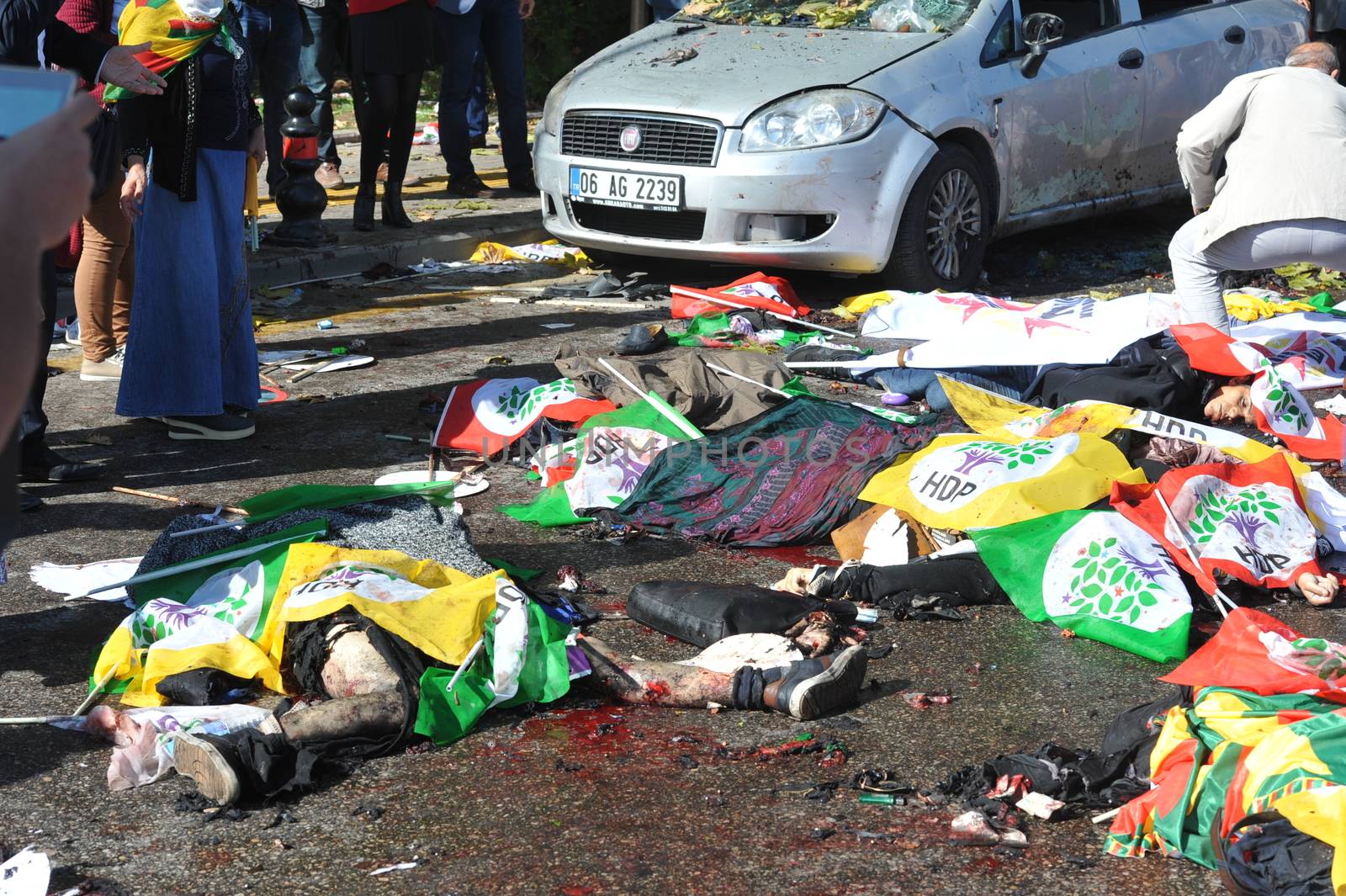 TURKEY, Ankara: Dead bodies lie on the ground after two explosions in the Turkish capital of Ankara killed nearly 100 people on October 10, 2015.The bombs went off near the main train station in the city. According to officials the bombs went off at a peace rally killing 97 and injuring 400 more.The rally was being held to call for an end to the conflict between the Turkish Government and the Kurdish PKK. As many as 14,000 people were at the rally when two suicide bombers detonated themselves in the crowd. No group has claimed responsibility yet for the attack. The death toll is expected to climb.