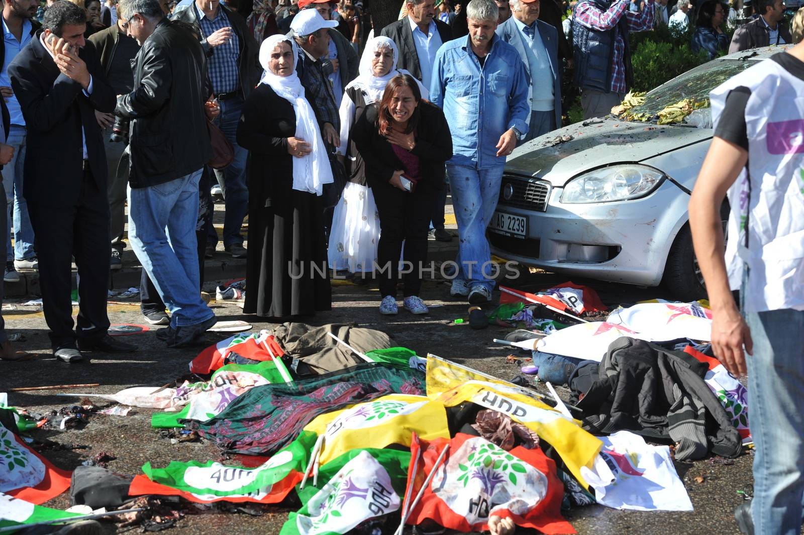 TURKEY, Ankara: Dead bodies lie on the ground after two explosions in the Turkish capital of Ankara killed nearly 100 people on October 10, 2015.The bombs went off near the main train station in the city. According to officials the bombs went off at a peace rally killing 97 and injuring 400 more.The rally was being held to call for an end to the conflict between the Turkish Government and the Kurdish PKK. As many as 14,000 people were at the rally when two suicide bombers detonated themselves in the crowd. No group has claimed responsibility yet for the attack. The death toll is expected to climb.