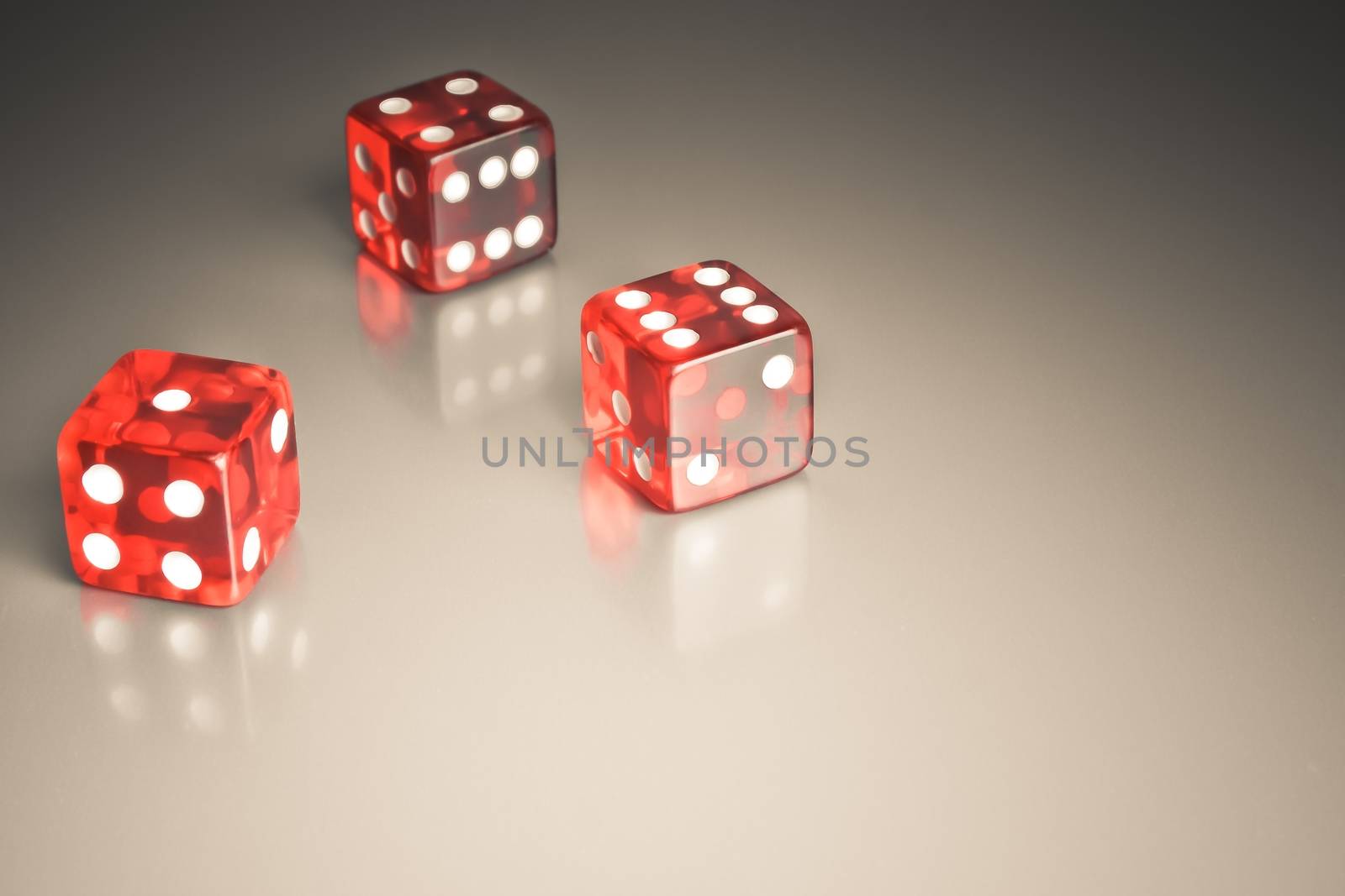 detail of red dice on a smooth surface