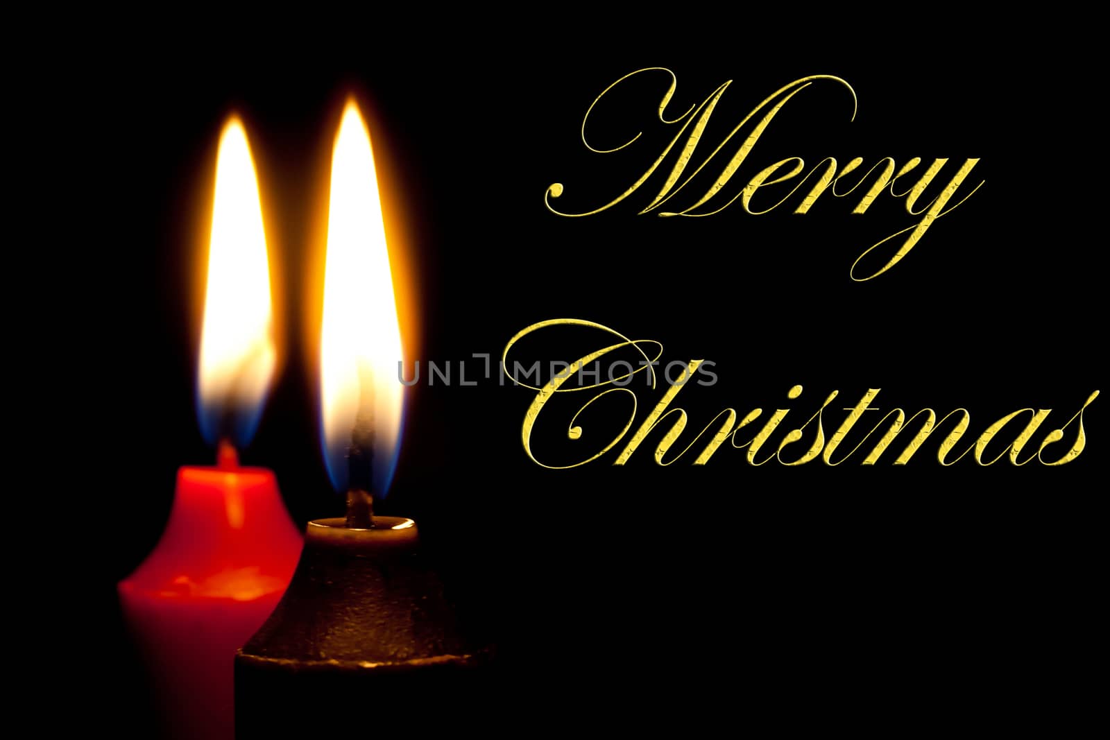 christmas candles on black background with space for text