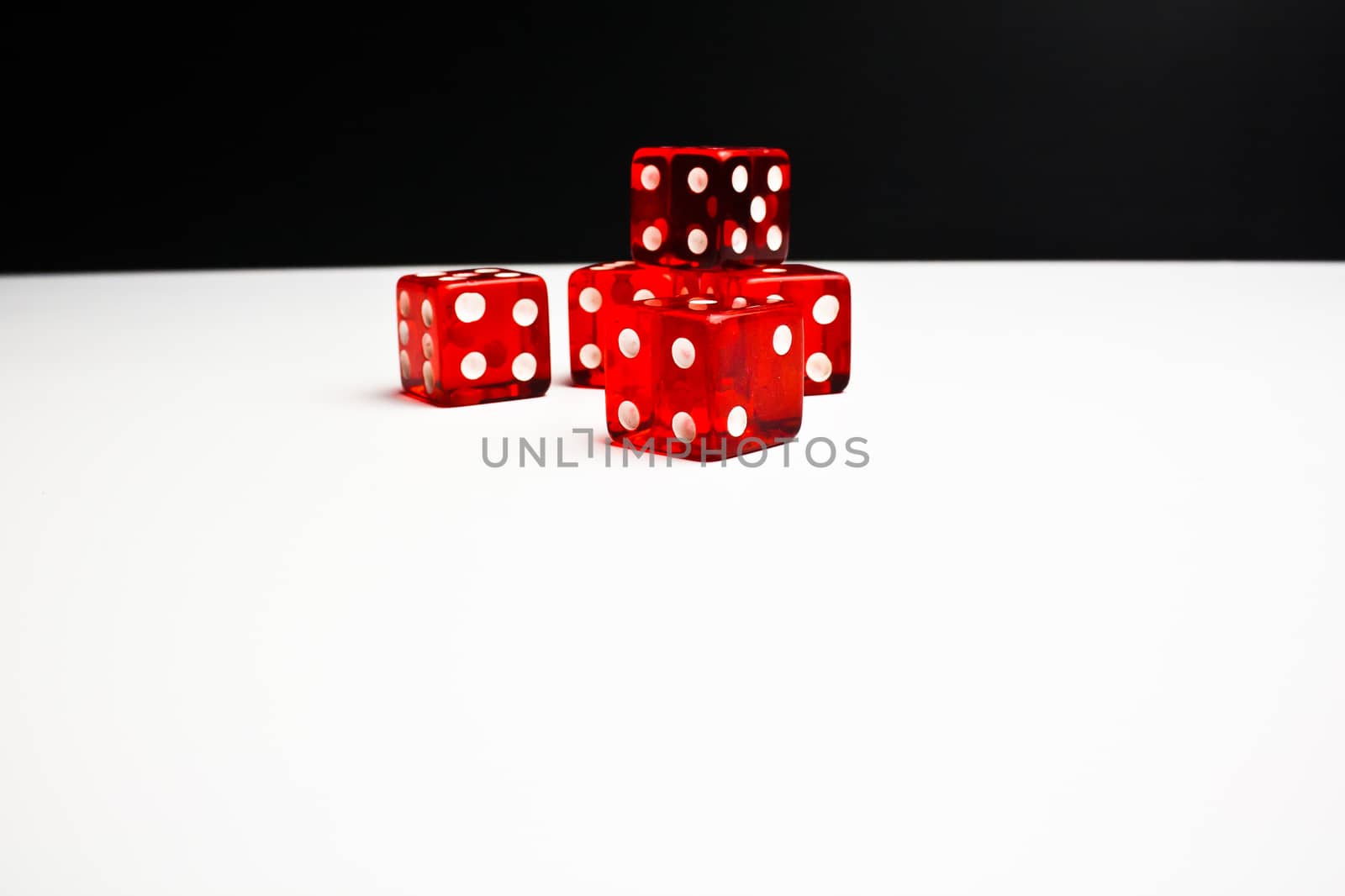 Close Up of  red dice on black and  white background