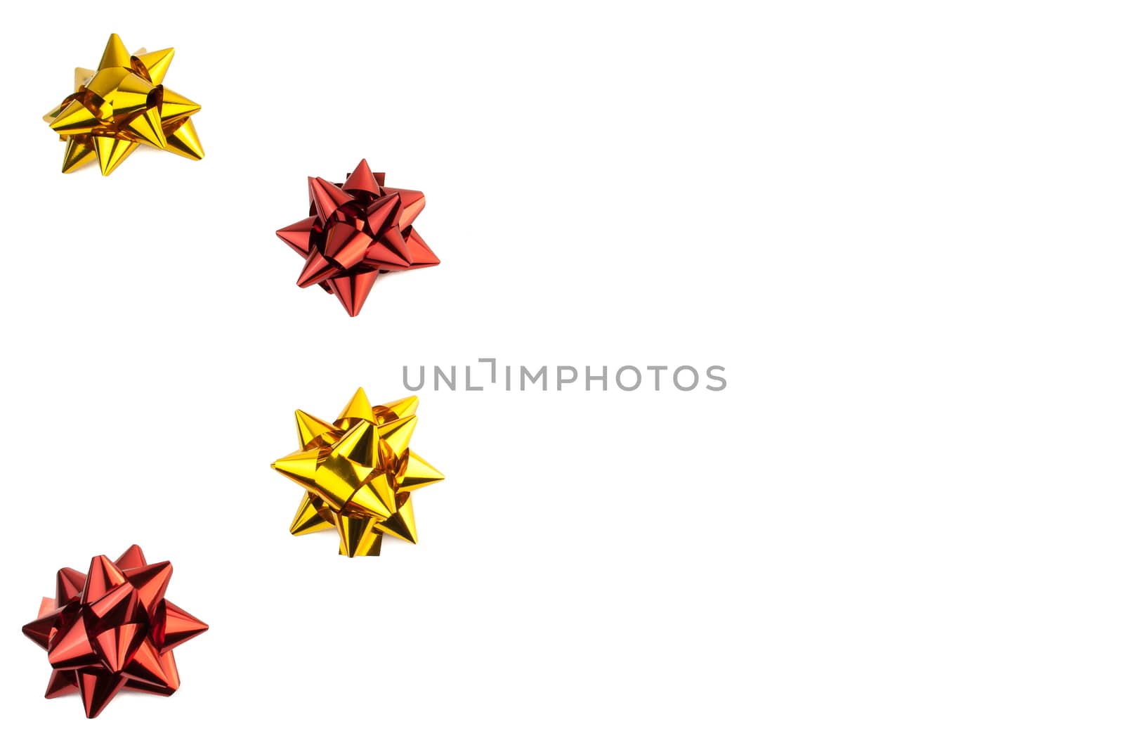 four red and gold bows on white background