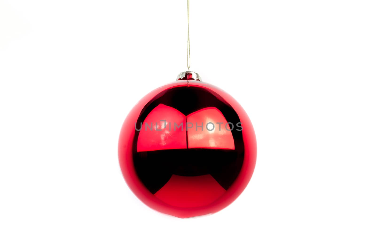 A smooth shiny red christmas ball, isolated on white with clipping path