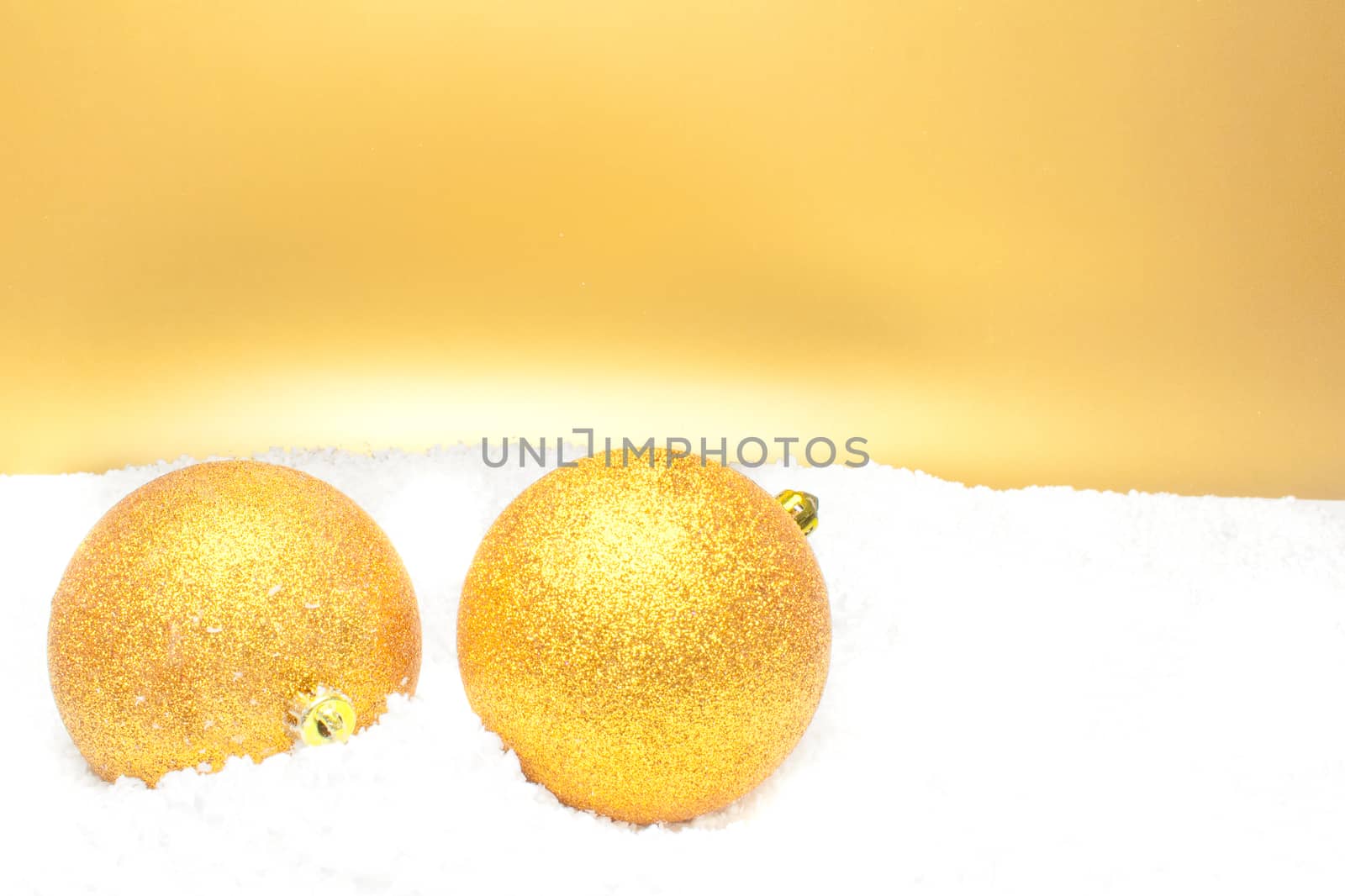 close up of a christmas balls on gold background