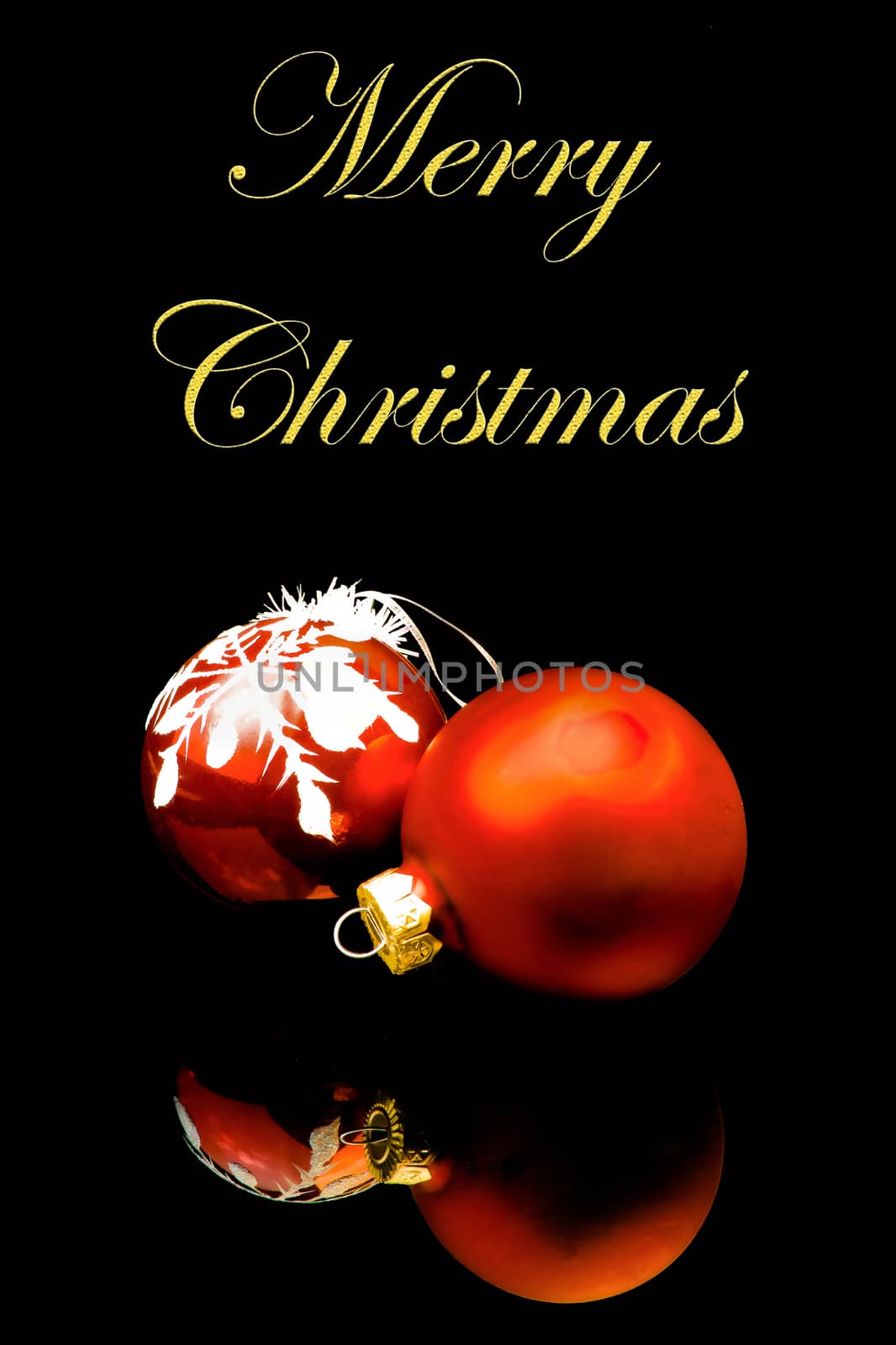 christmas balls decoration on black background with space for text