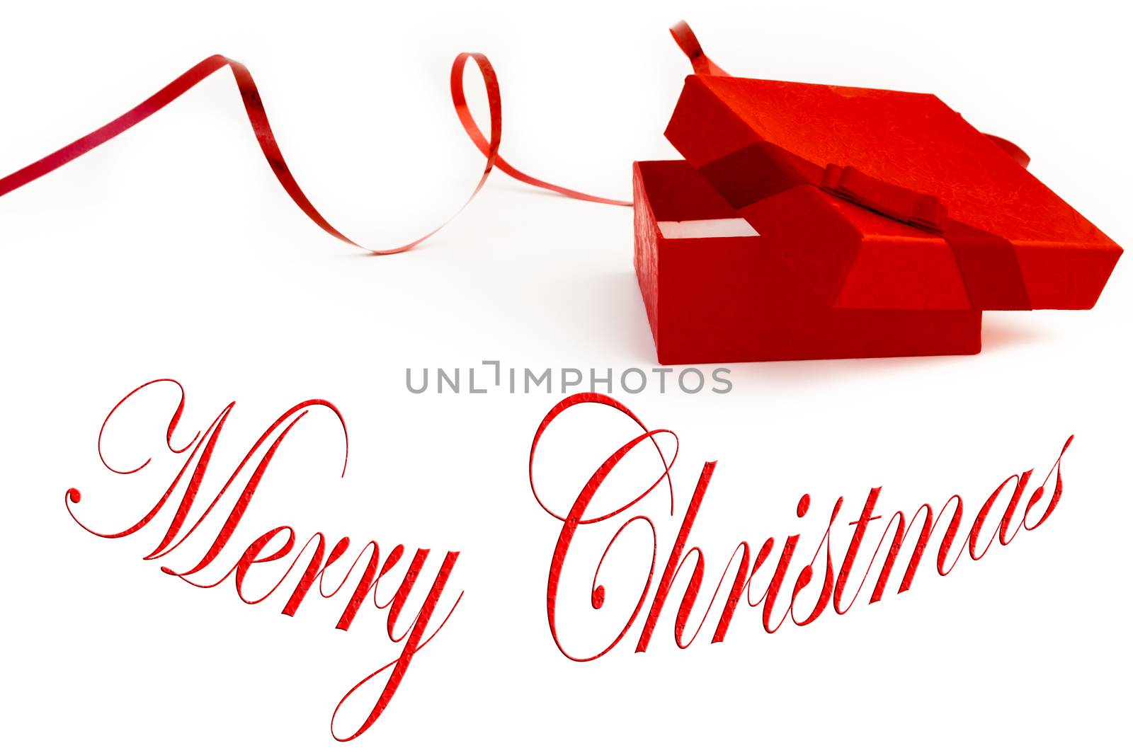 christmas gift box decorated with ribbon on white background with space for text